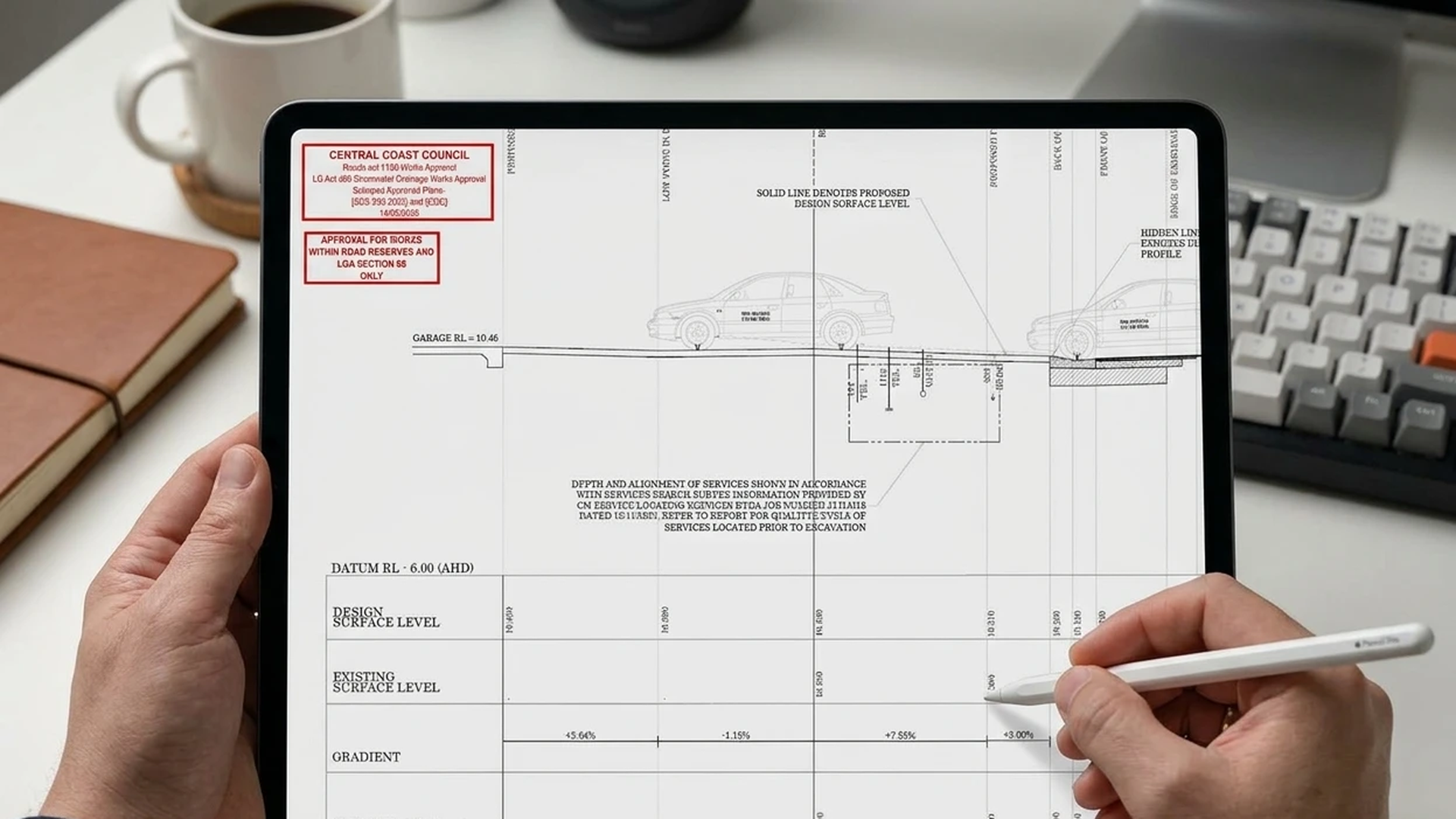 Approved Section 138 driveway design plan reviewed on a tablet